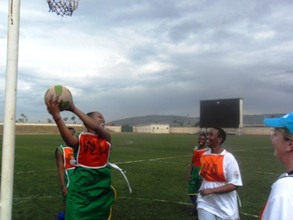 Minister of Gender and Family playing with girls