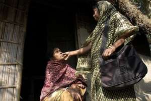 Community health promoter on her daily rounds