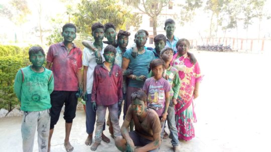 Children are playing with colours