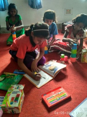 Children while doing drawing