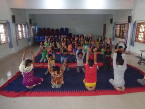 Children while doing yoga