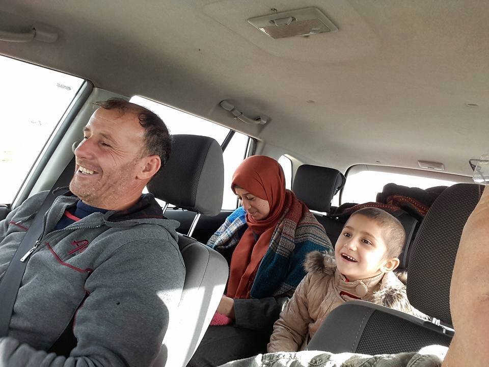 A patient and her family traveling to the hospital