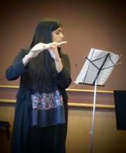Lina performing with ensemble in Santa Clara