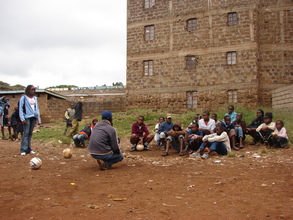 Peer educator Eric Omalla, debriefing a game about HIV/AIDS