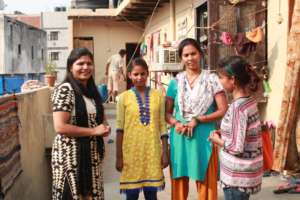 Faiza meets with the family of a GEP student