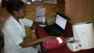 Hospital nurse with donated laptop