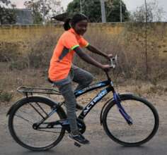 Dhani with her bike