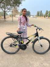 Namrata with her new bicycle