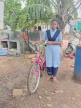Samrudhi with her bicycle
