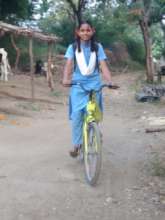 Sanika with her bicycle