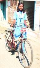Sheetal with her bicycle