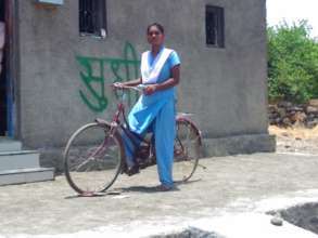 Swapnali with her Bicycle