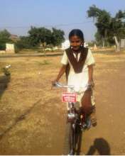 Trupti with her bicycle