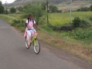 Diksha with her bicycle