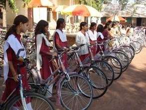 Area school girls & their bicycles, ready to race.