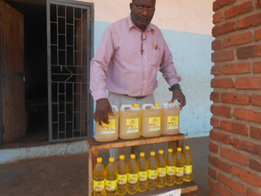 The factory Manager displaying the oil products