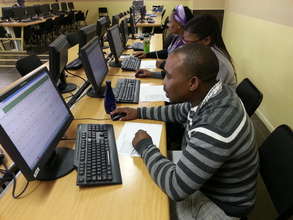 Mzamomhle teachers reviewing learners' progress