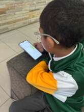 Learner busy with Maths at home