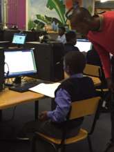 Anele assisting learners