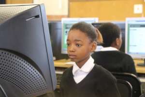 Learner completing her online Maths exercise