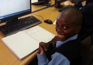 An Mzamomhle learner loving his online Maths