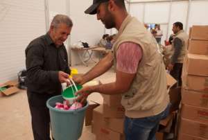 Giving out hygiene products continues to be vital