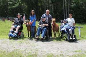 Veterans group with miniature horses
