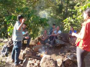 Nacho leads fire ceremony with eco-tourist group