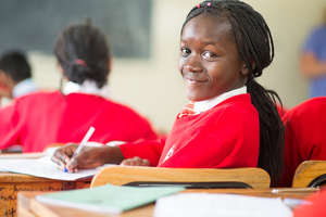 Phaustine, an orphan from Kibera, proud to study!