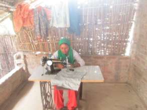 Hasina with her sewing machine