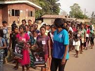 Young girls  in a rally to  stop FGM/C
