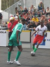 Alex of Kenya against Ngeria's S. Asanjo of Nigeria in the Homel