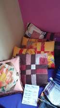 Patchwork throw pillows made by Elsy and Delia