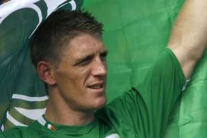 Captain Simon with the Irish Flag