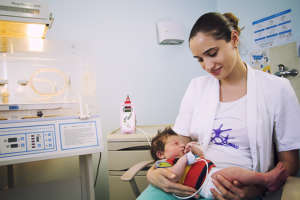 Healthy and happy mother and baby