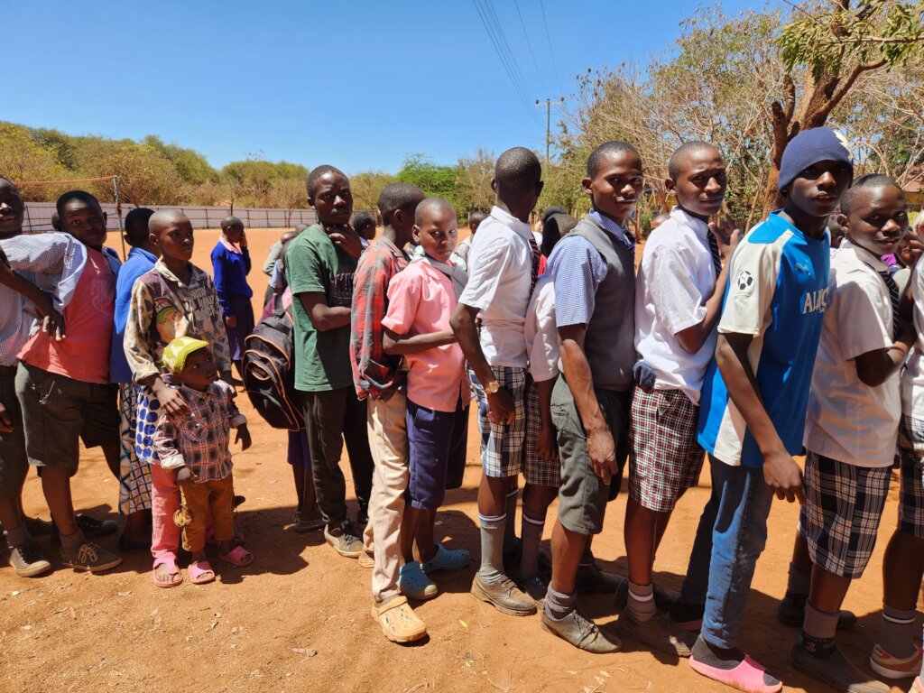 Food lines swell after floods