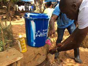 Local youth using the new hand washing station