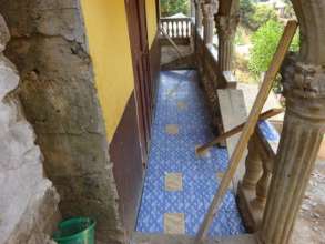 Laying tiles on the veranda