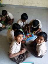 All smiles while playing Building Blocks!