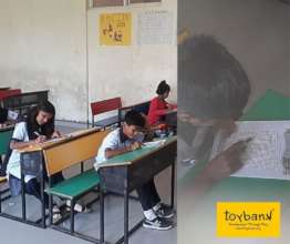 Children play Word Search before class begins