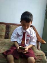 My youngest child tries focus on his online study