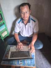 Me working and writing my final paper at home