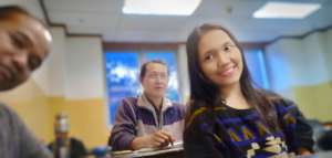 With classmate in English class
