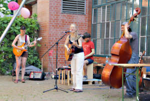 Musicians playing at festival for neighborhood