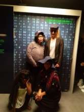 Disguised group members in the museum of espionage