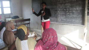 Students being welcomed by teacher