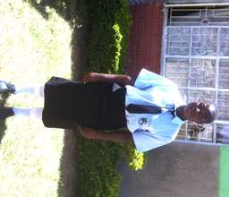 Beverly in her  school unform