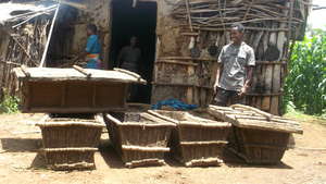 New beekeeper shows off the beehives he made