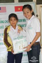 PeaceTrees Staff Member with Scholarship Recipient