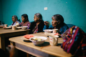 Eldery eating at our feeding center